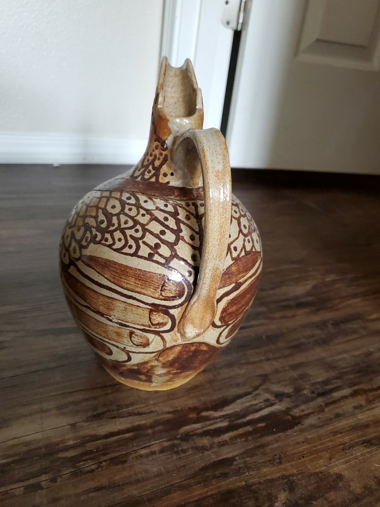Amazing Pottery Pitcher Signed SF