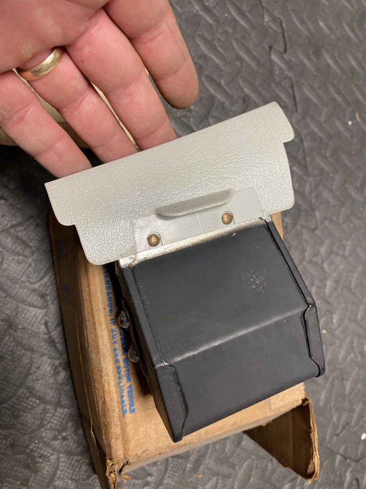 1973 THUNDERBIRD FORD ASHTRAY PULLOUT BRACKET NOS D2SZ-6504810-A