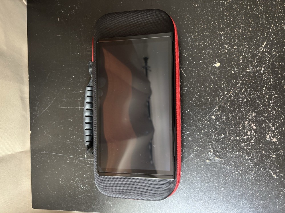 Nintendo Switch OLED Bundle with Joy-Con Controllers, Controller Grip, FC26 Game