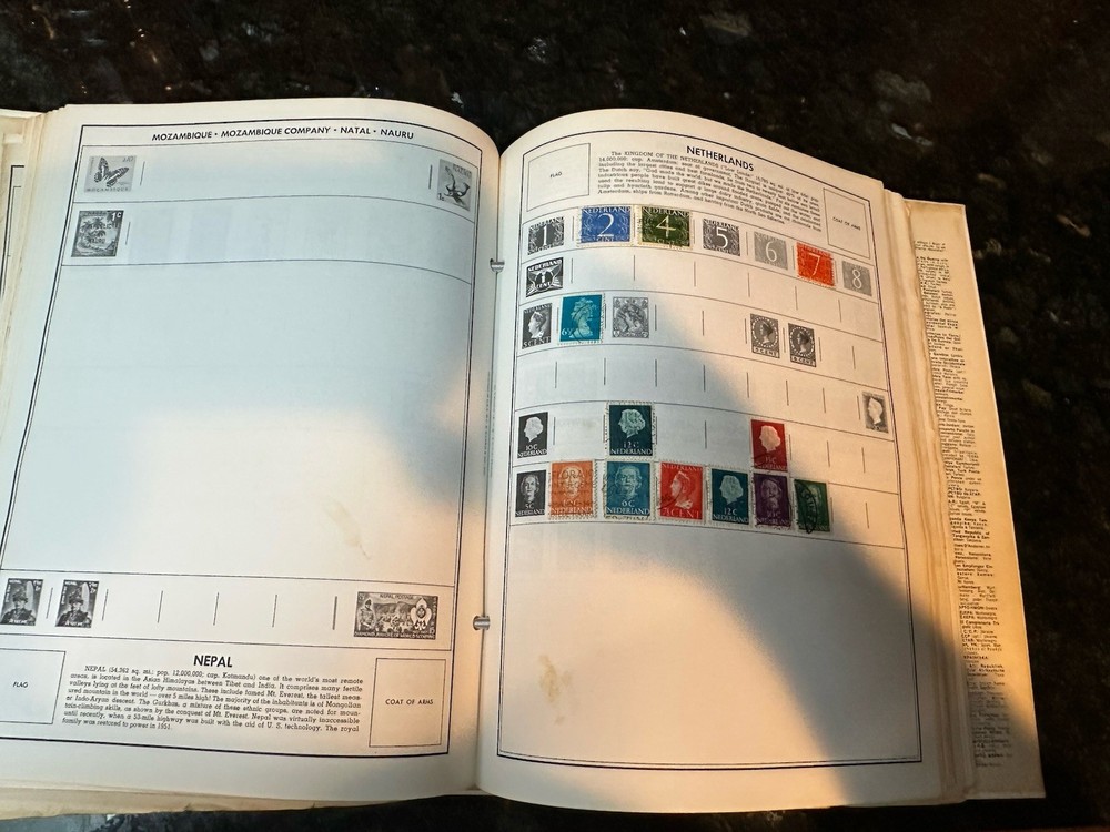 VTG 1977 Traveler Stamp Album With Many Stamps.