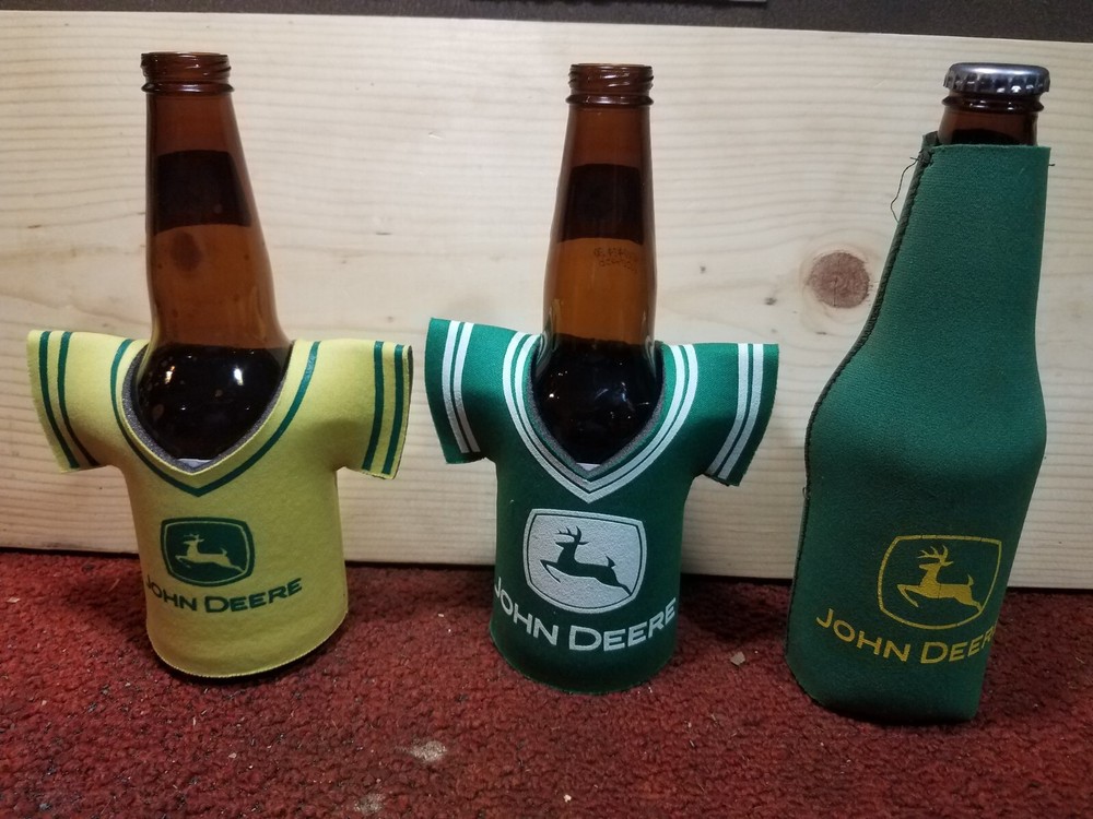 Three John Deere bottle cozys
