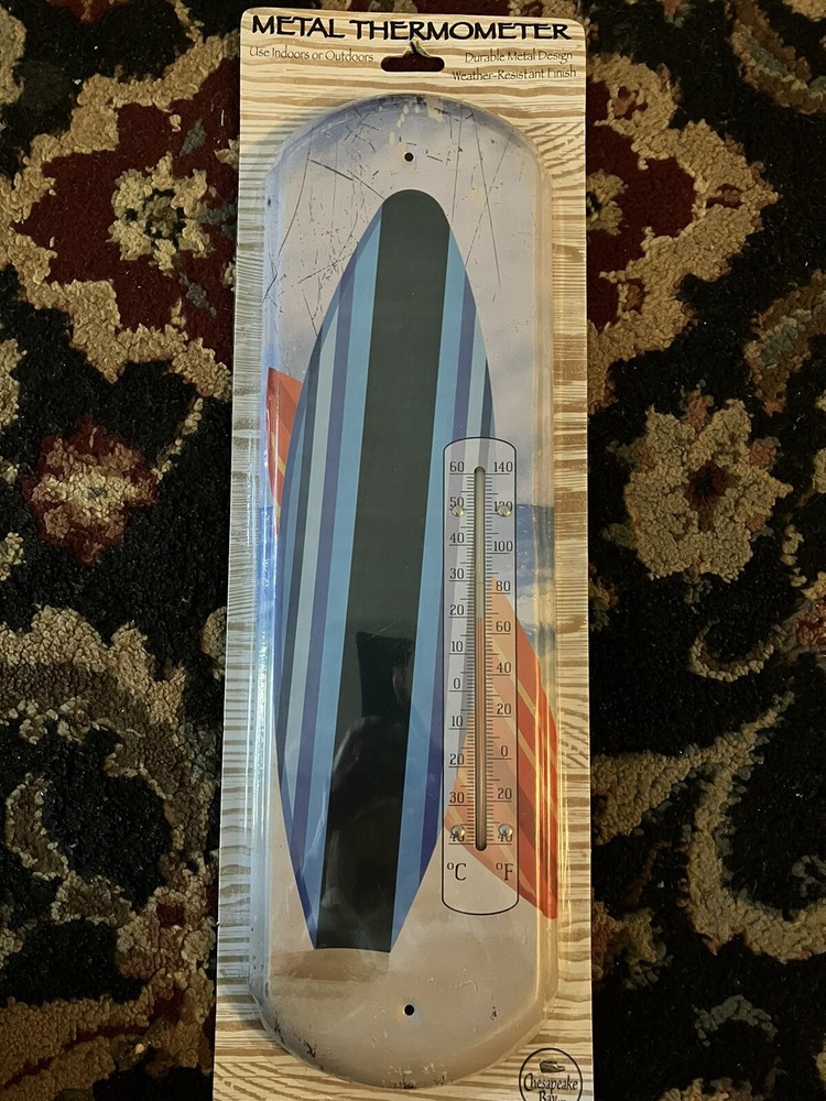 large metal outdoor thermometer