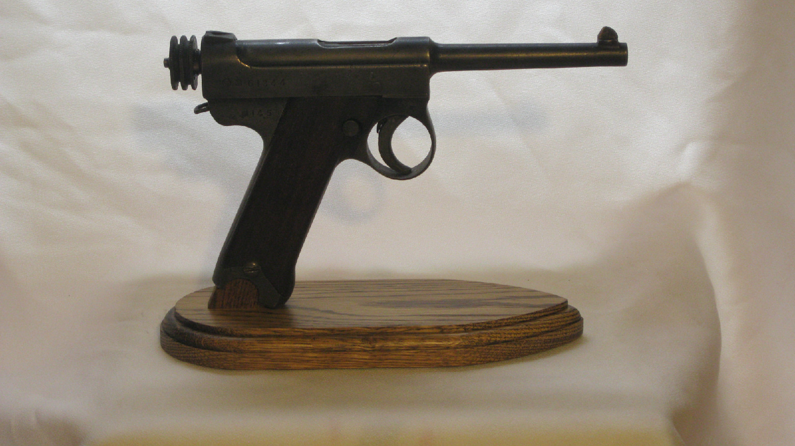 Handgun rack; handmade for 1 Nambu 14 style; made from oak;