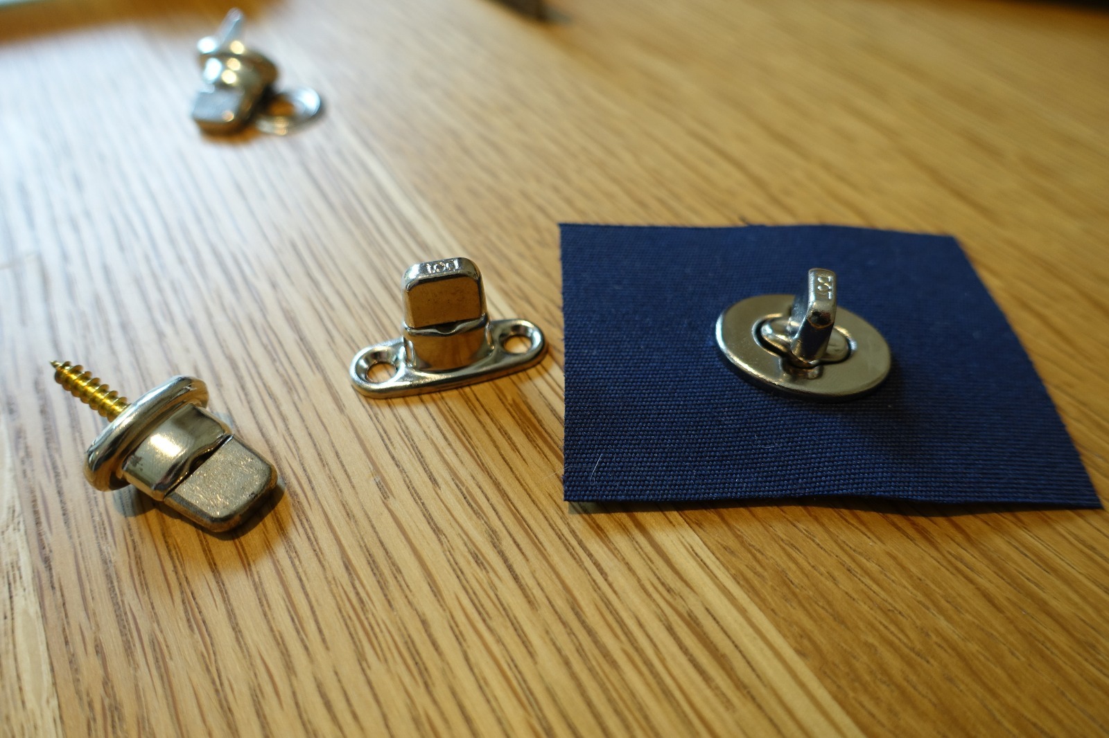 Turn button / common sense fastener hole punch cutting tool by J Clarke Marine