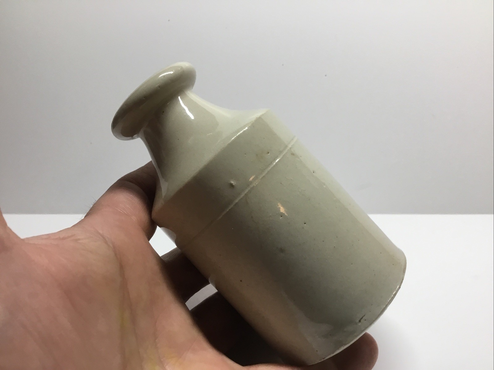 Antique Cream Colored Stoneware Polish Bottle. 4 5/8 Inches.