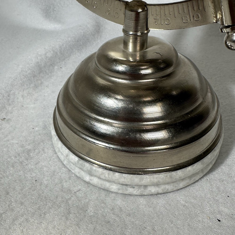 Small 9” Silver Globe Spins On Axis with Base