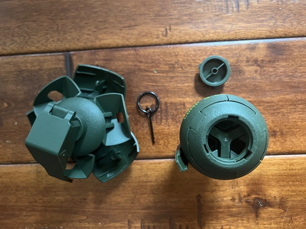 (2) Airsoft Spring Powered Reusable Grenades