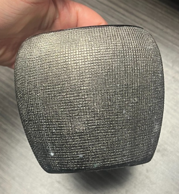 Silver and black tooth brush holder