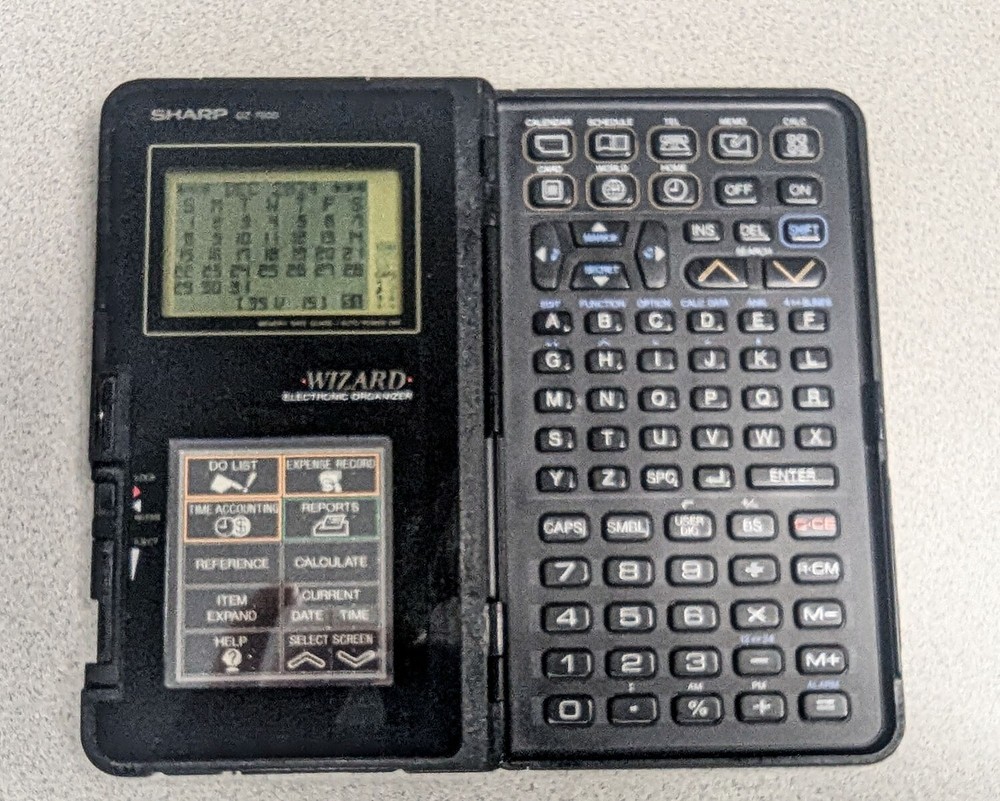 Sharp Wizard OZ-7000 Electronic Organizer with Time & Expense Manager Card