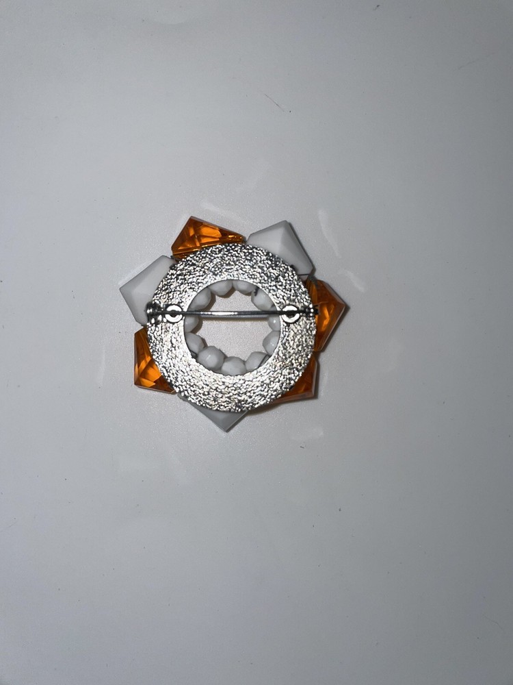 circle brooch orange and white beaded