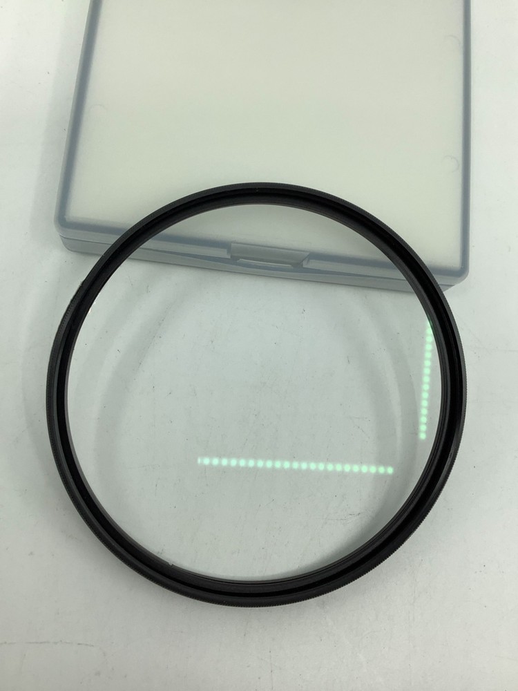 Sigma 82mm Protector Filter - Fair Condition; Nick/s in filter