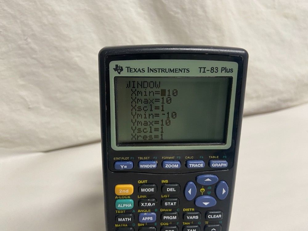 Texas Instruments TI-83 Plus Graphing Calculator Tested Working small dark spot
