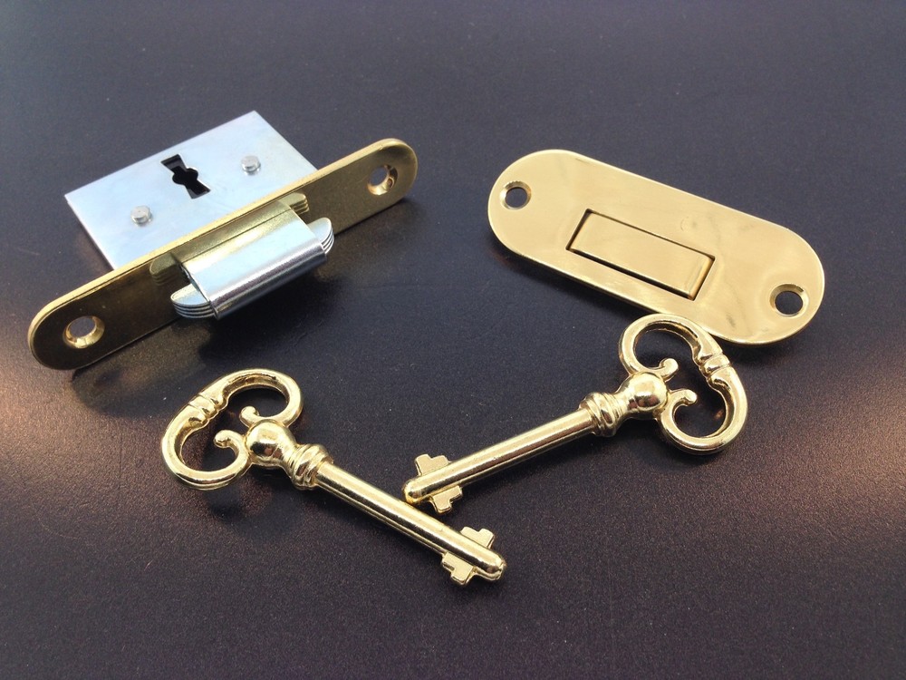 Roll-top Desk lock with self closing strike hardware