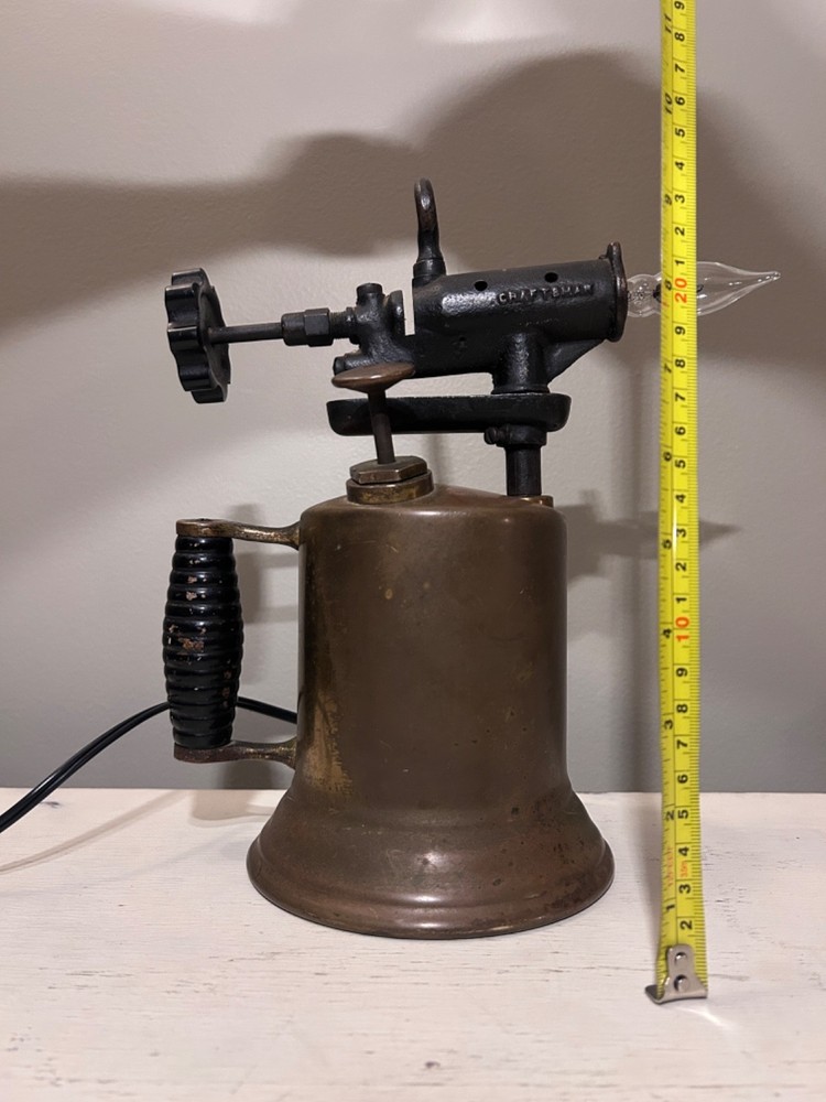 vintage brass torch lamp