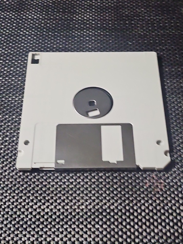 5.25" floppy disk labeled "Disk 1/2 Mouse Driver 155159-01 Untested Buying As Is