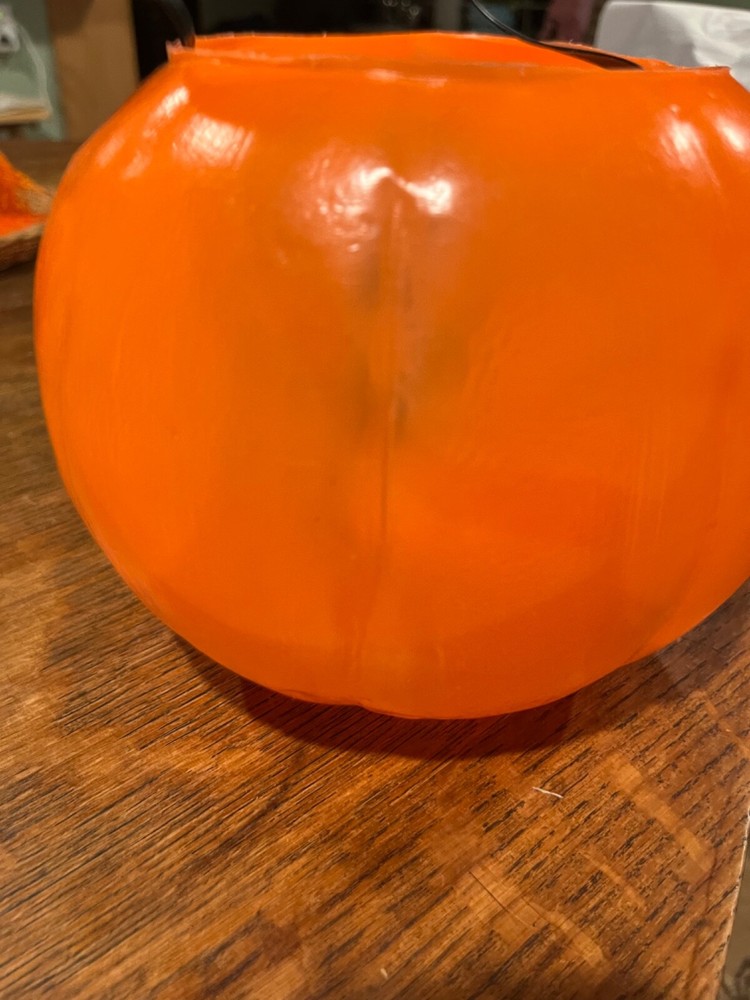 Two jack o lantern pumkins