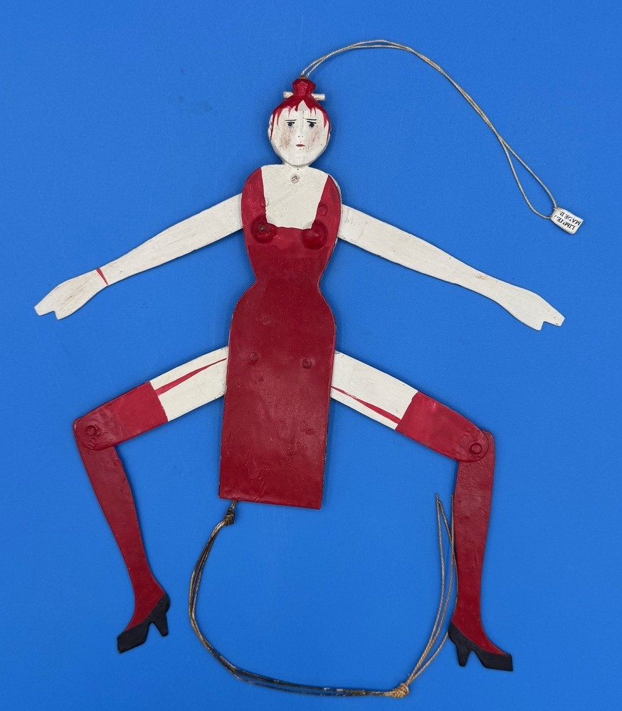 PAINTED METAL "JUMPING JILL" PULL STRING TOY FIGURE