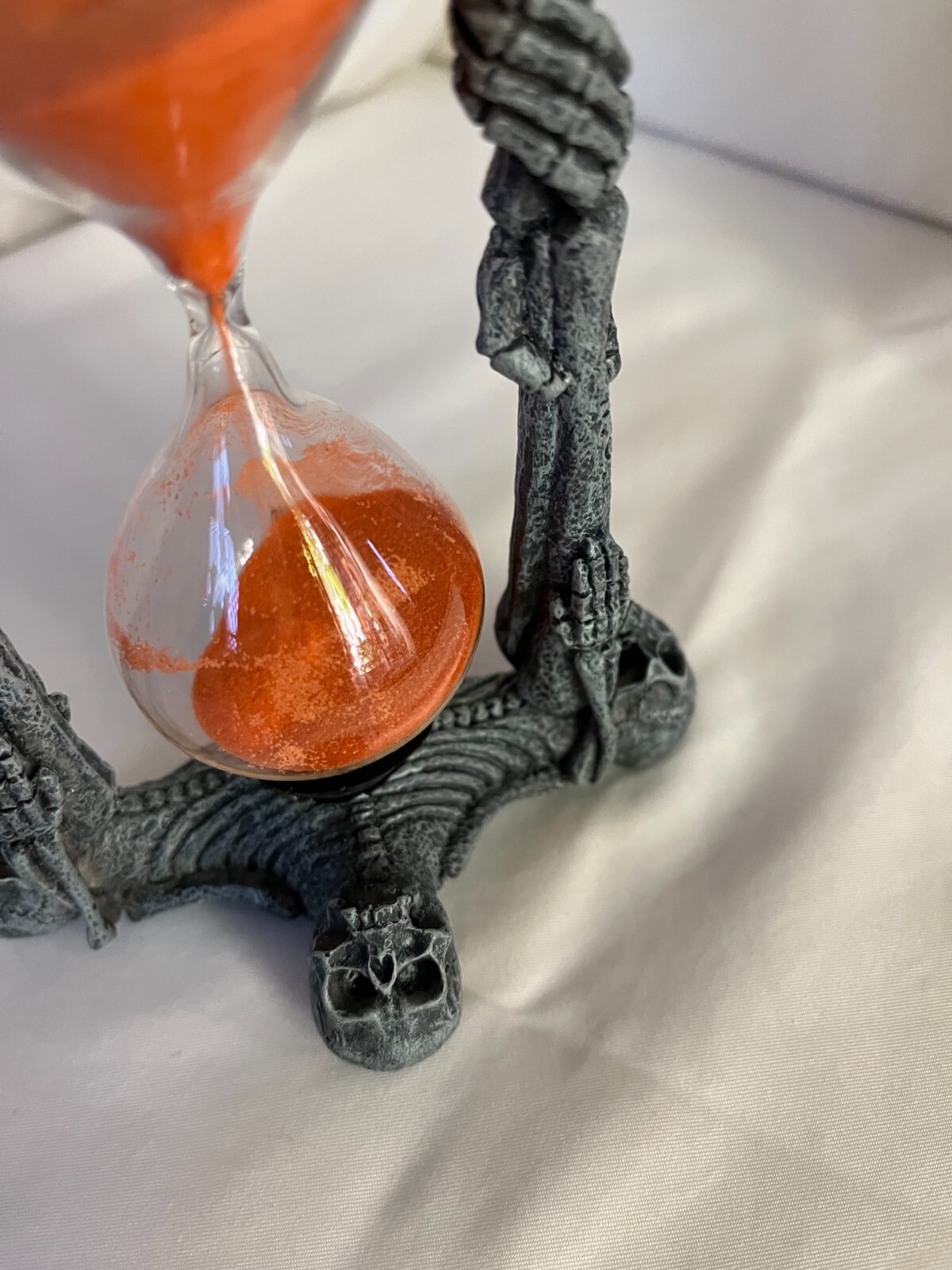 Hourglass Skeletons w/orange sand