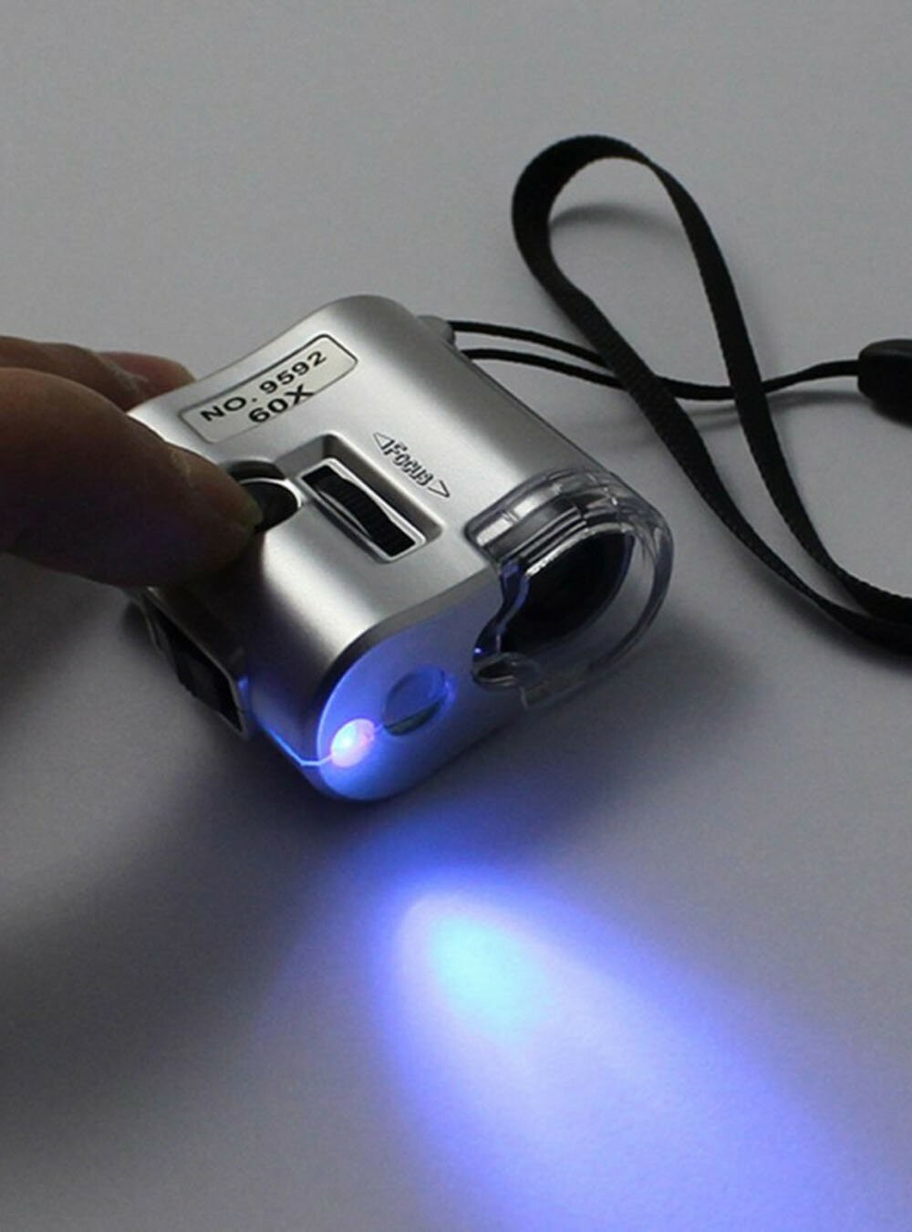 CKStamps: 60X Pocket Mini Magnifier Microscope Loop w/LED UV Light(Color:Silver