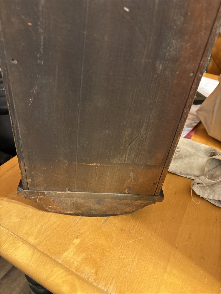Vintage spring pendulum clock made by Meiji Clock Co.