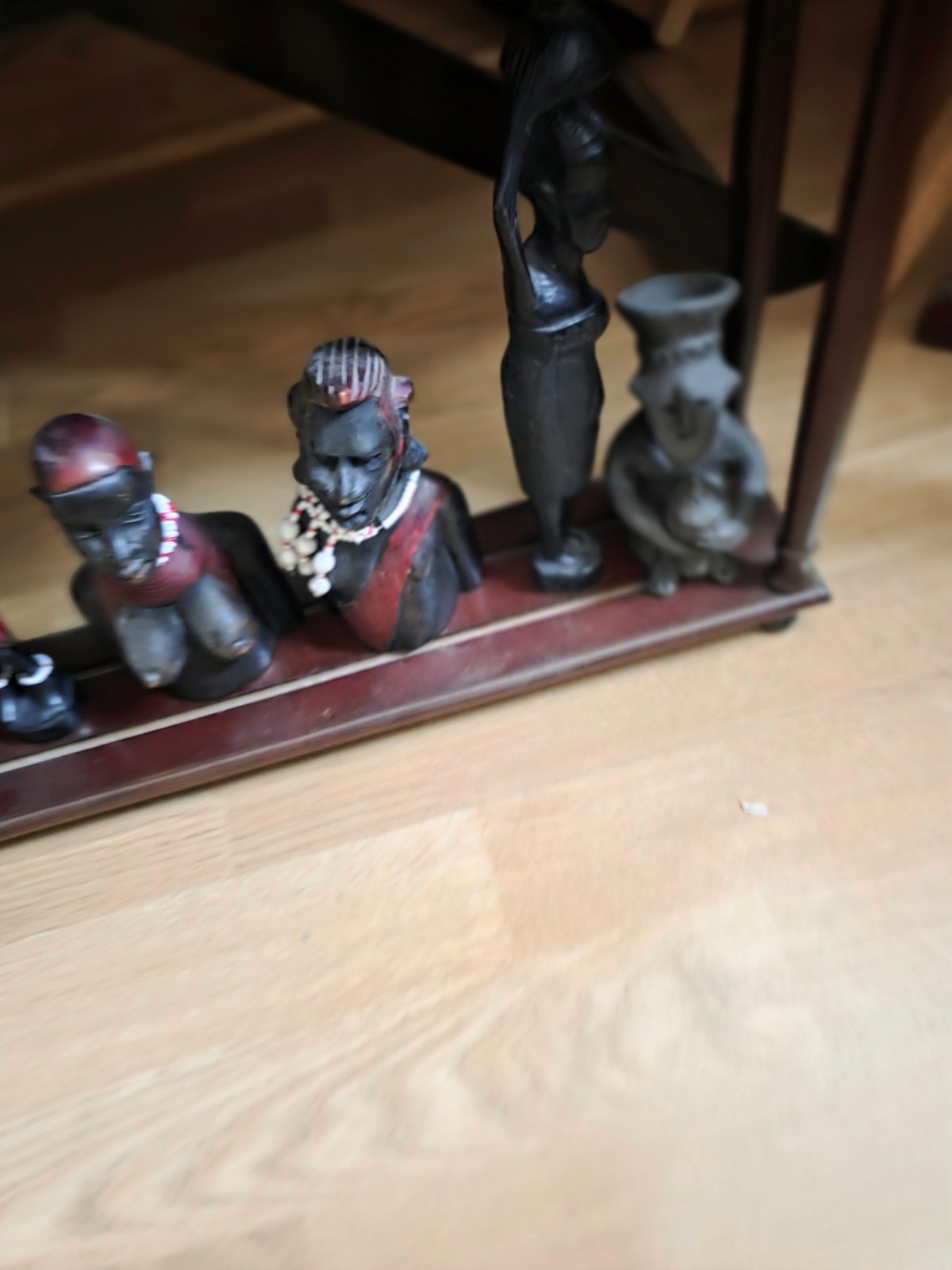 Set of carved statues from black wood, stone, bronze.