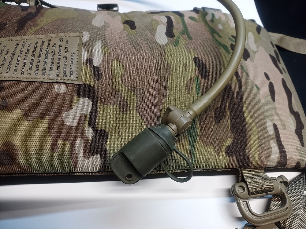 GENUINE US MULTI-CAMO HYDRATION BACKPACK SYSTEMS. PRE OWNED- USED UNITS.