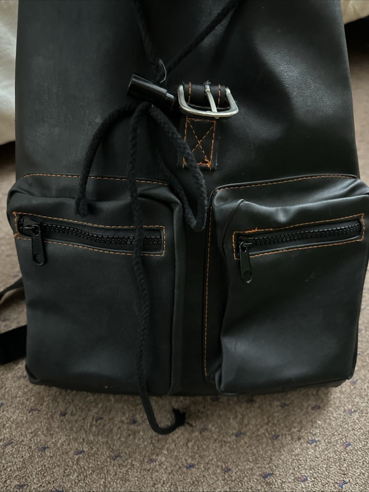 vintage-style black leather backpack