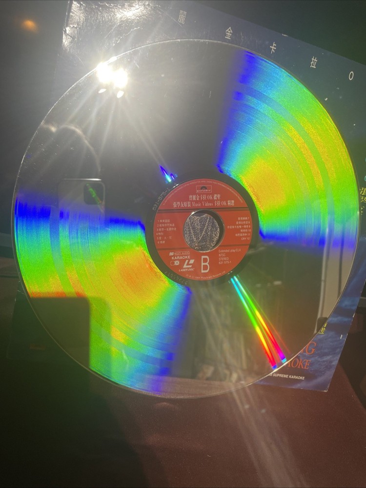 張學友原裝MTV卡拉0K大畫冊海報大影碟LD收藏品相完美