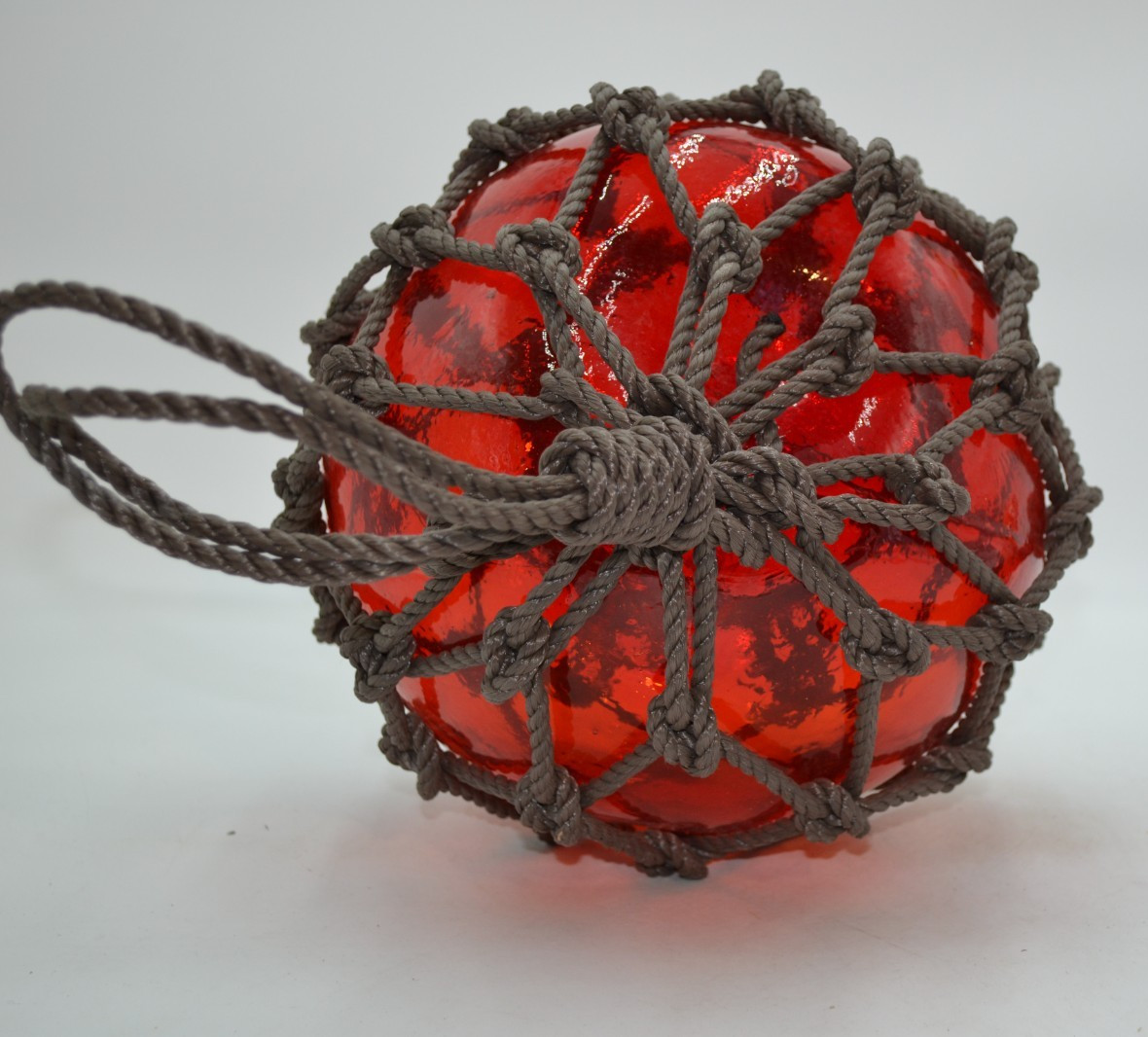 VINTAGE GLASS FISHING FLOAT IN RED AMBER