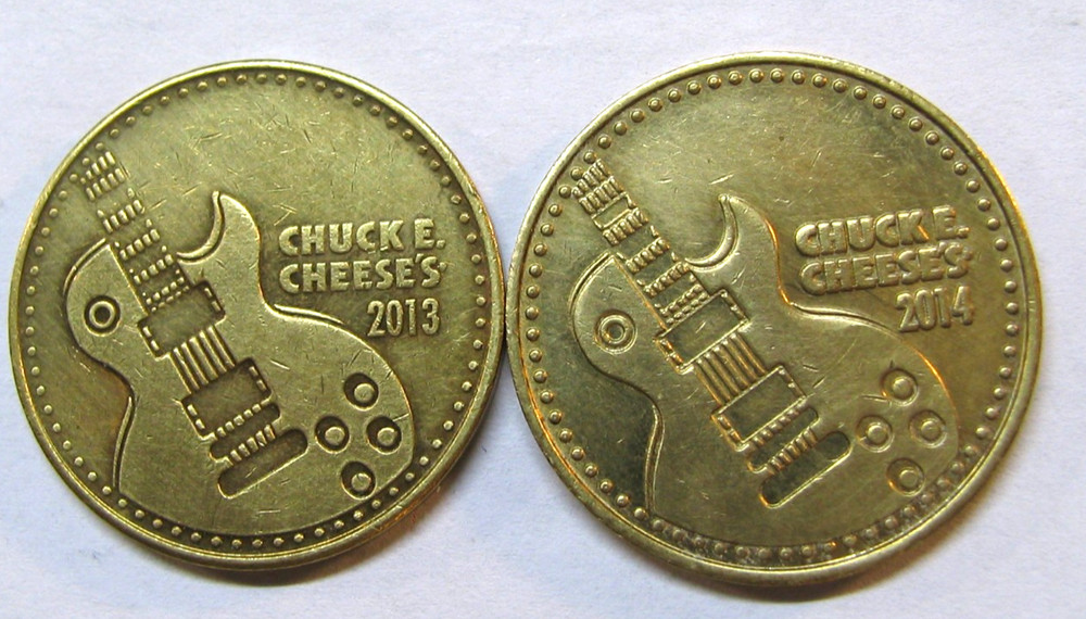 2013 & 2014 CHUCK E CHEESE ARCADE GAME BRASS COIN TOKENS *  CHUCK E.ROCKS *