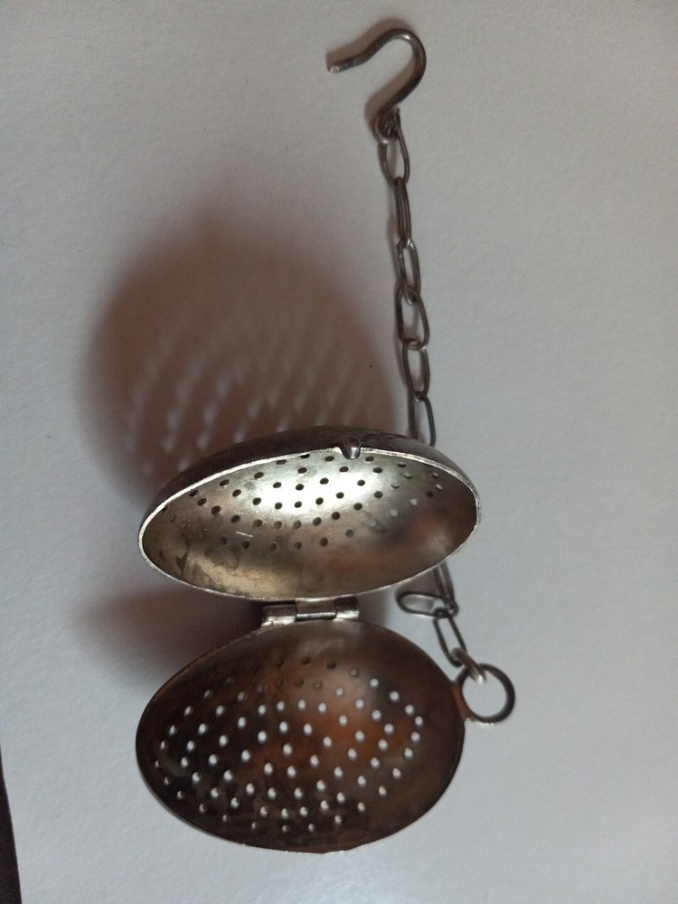 Antique Signed Silver Tea Strainer stamped AEC. Old egg shaped quality