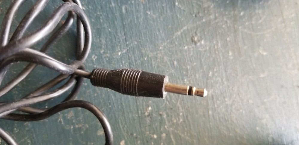 Two vintage wired microphones with metal/chrome/mesh tip