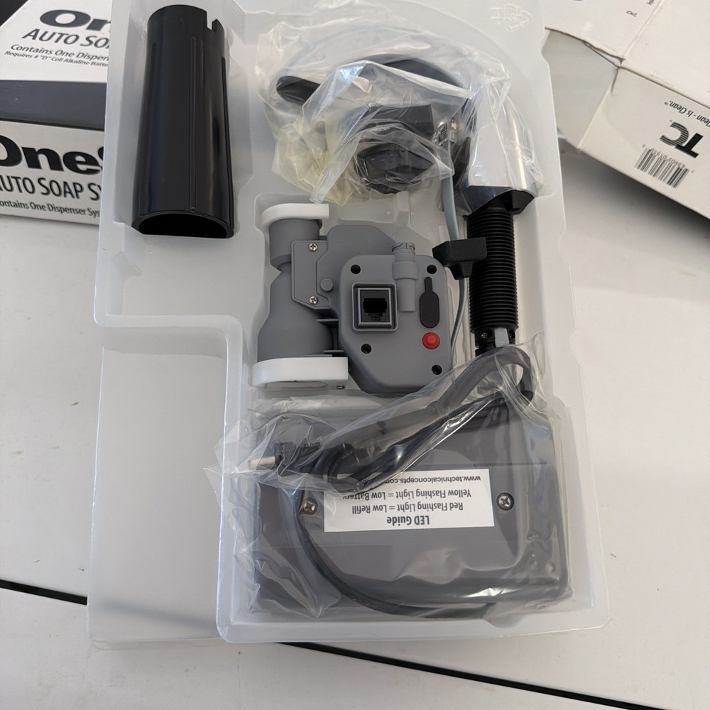 Soap dispenser with auto sensor. One Shot Auto Soap System