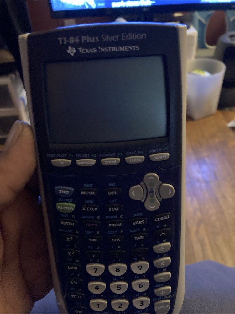 Texas Instruments TI-84 Plus Graphing Calculator - Silver