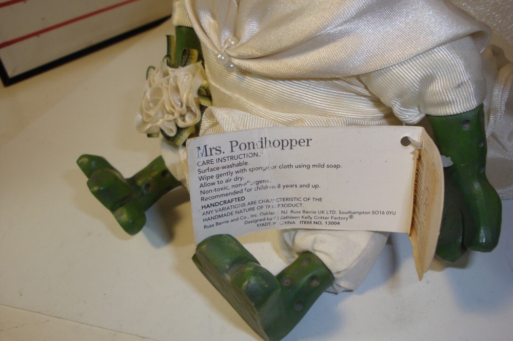Mr. And Mrs.Pondhopper figures with tags