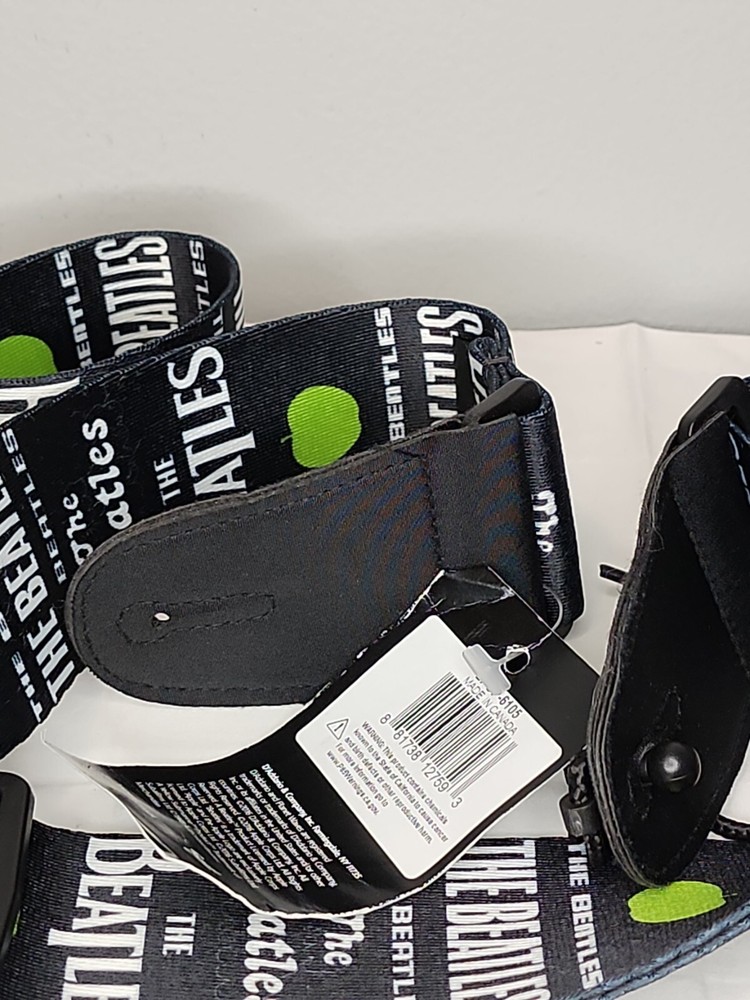 The Beatles guitar strap.
