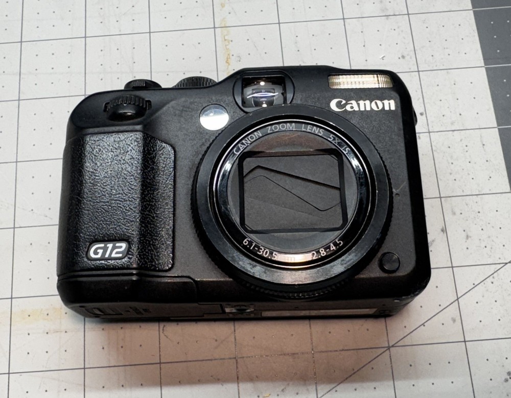 Canon PowerShot G12 10MP Digital Camera (read)