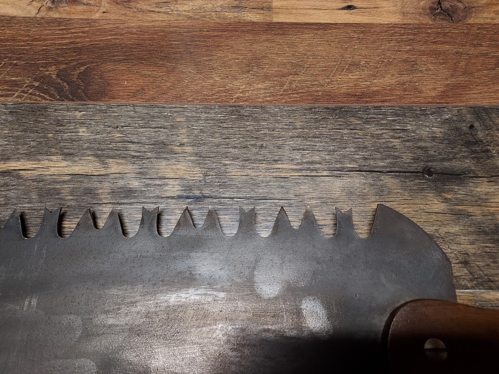 WARRANTED SUPERIOR 48 " LOGGING SAW WITH HOLES FOR ADDITIONAL HANDLE SHARP USED