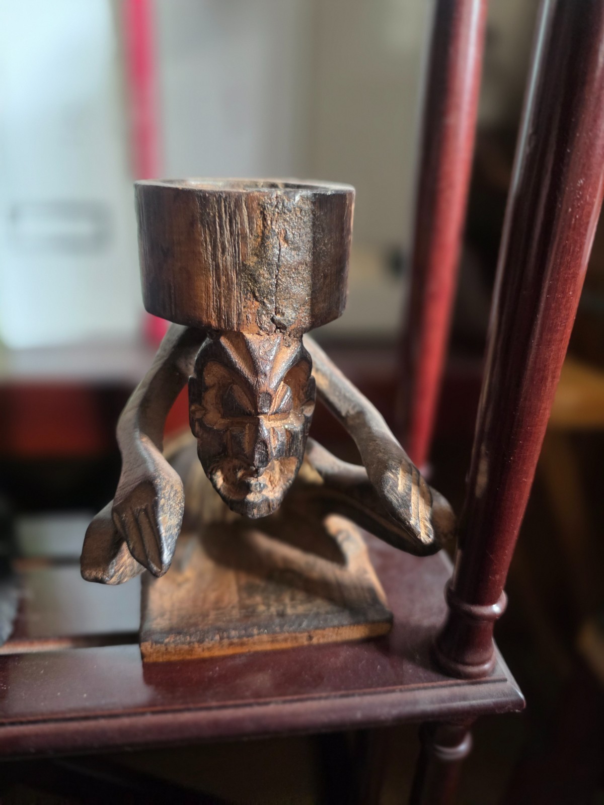 Set of carved statues from black wood, stone, bronze.