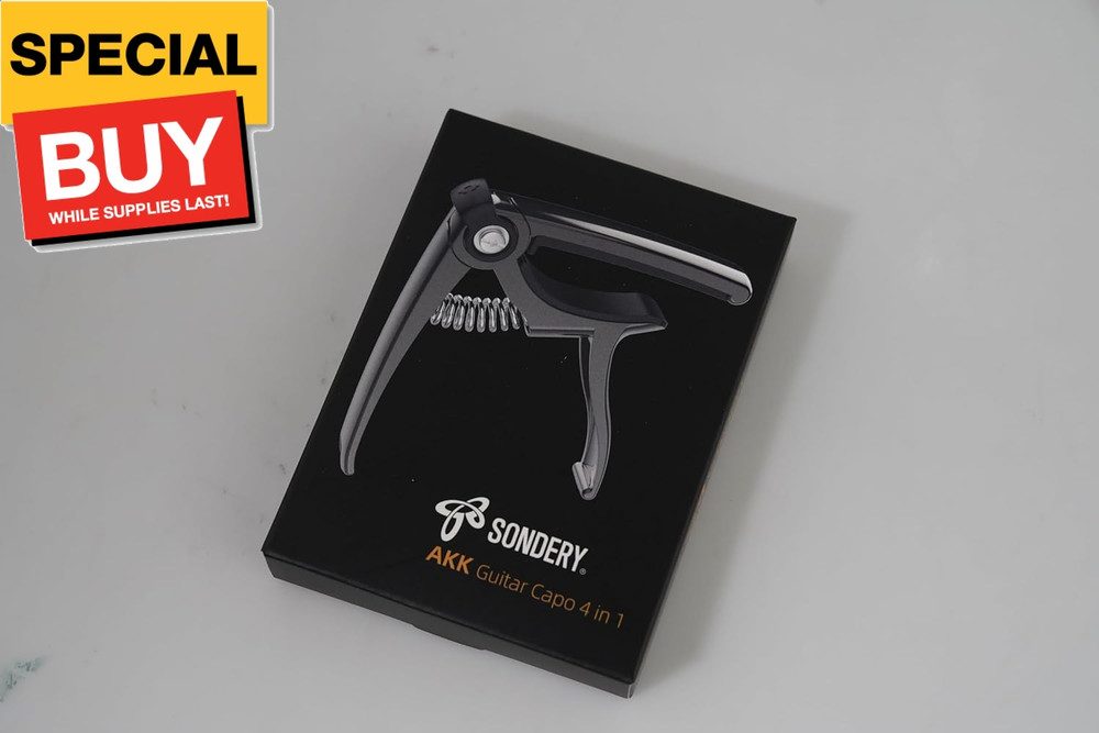 4-in-1 Guitar Capo Includes String Cutter Pin Puller Pick Holder and 5 Guitar Pi
