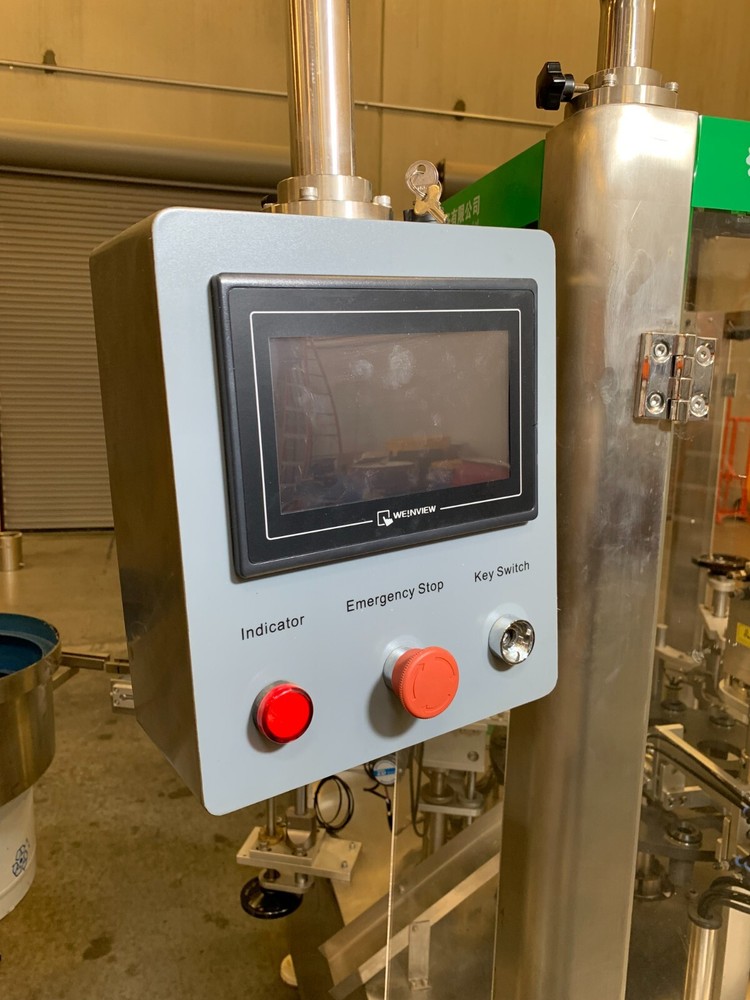 Automated Filling and Capping machine