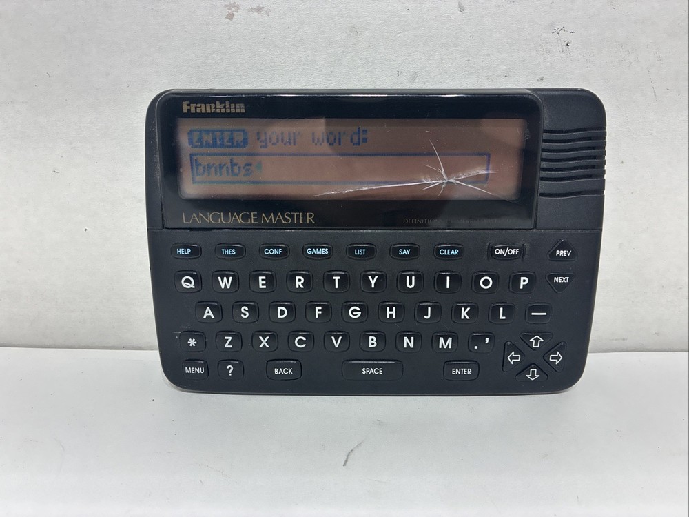 Language Master Franklin Lm-4200. Crack In Screen. Tested Works Great.