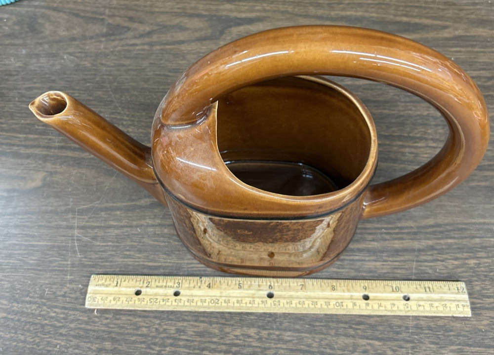 Multi shade brown ceramic circular handle decorative planter 9"h., 11 1/2"w