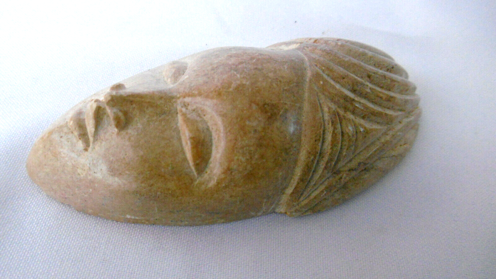 Face Carved IN Stone