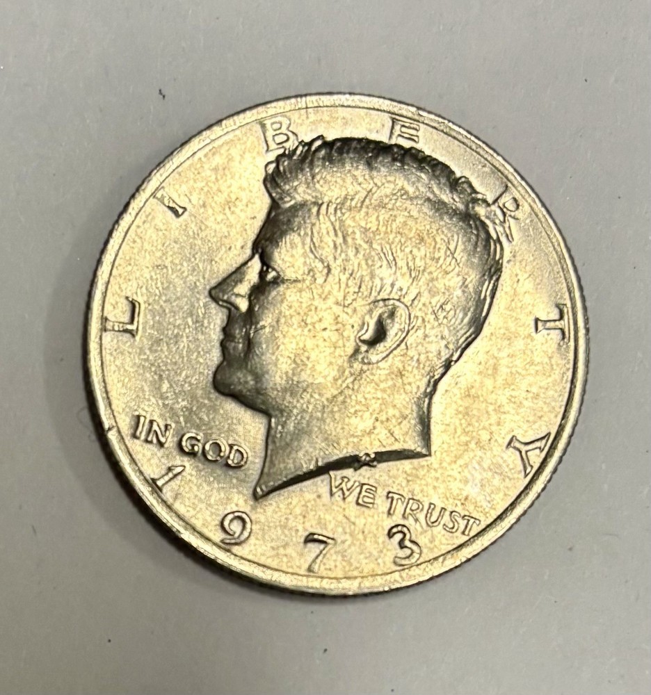 1973 Kennedy Half Dollar With No Mint Mark, Error On E