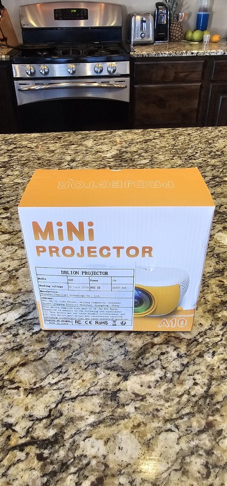 DBLION A10 Mini Projector Yellow Desktop, Multifunctional Interface, Own Audio