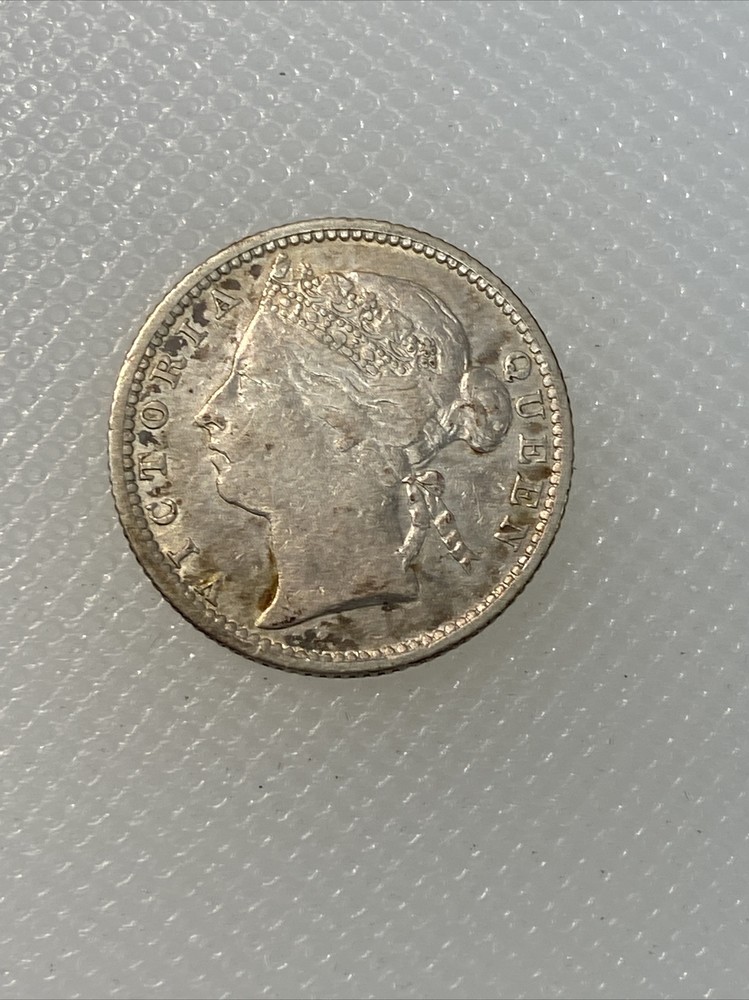 1886 straits settlements 10 cents M2