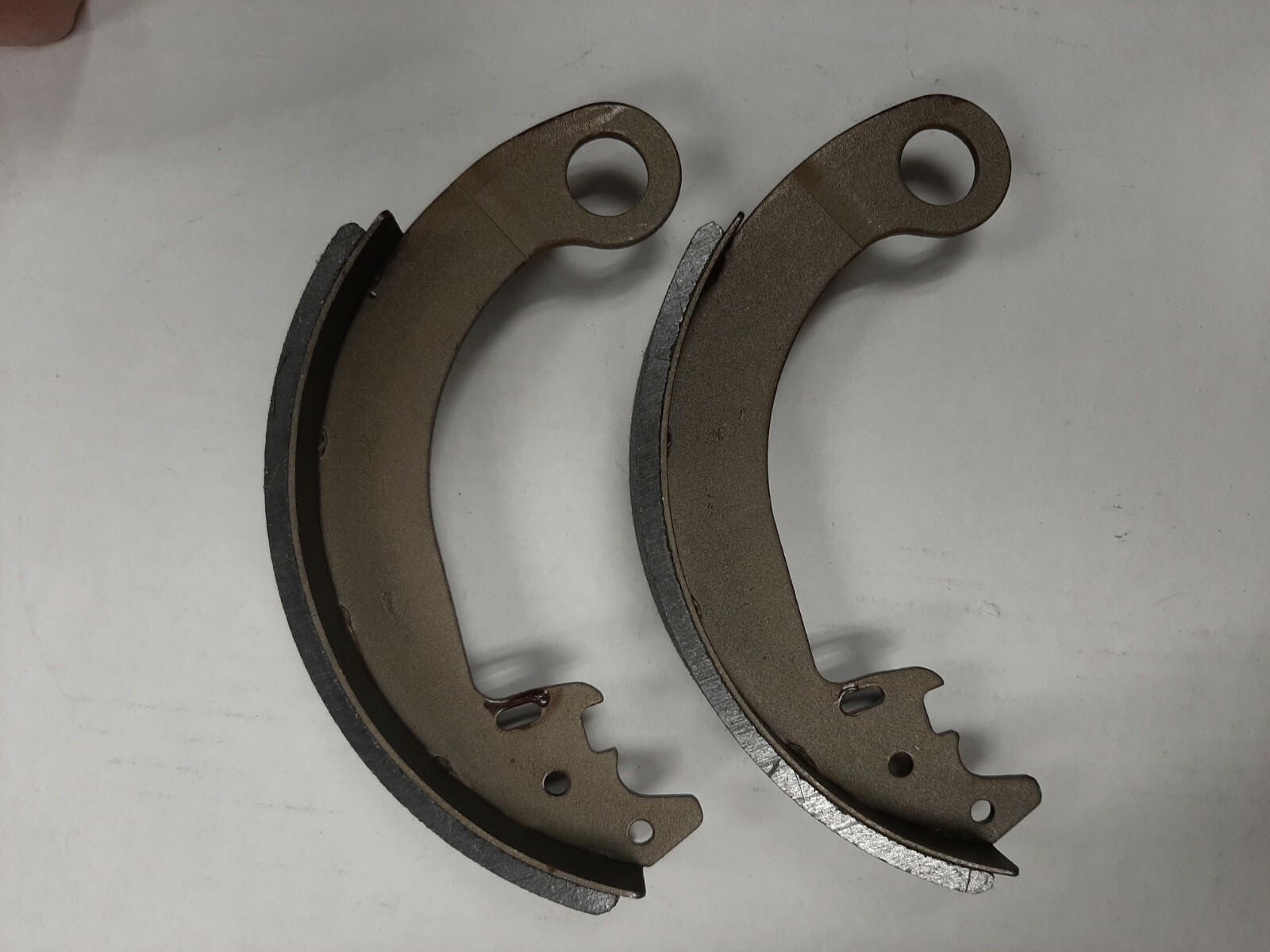 New Cushman Pair of Brake Shoes 887284 or 876324. See our other listings 4 kits