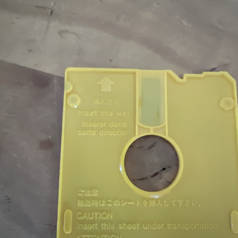 Vintage Apple Macintosh Plus - Yellow Floppy Drive Plastic Protector Disk