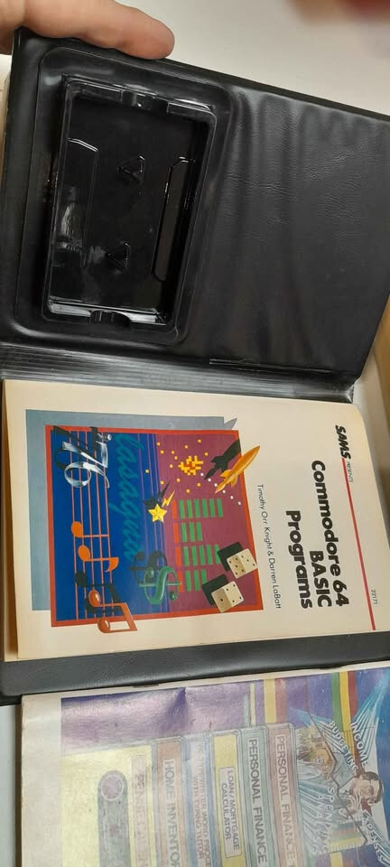 Vintage Commodore 64 computer in box, manuals and programs package